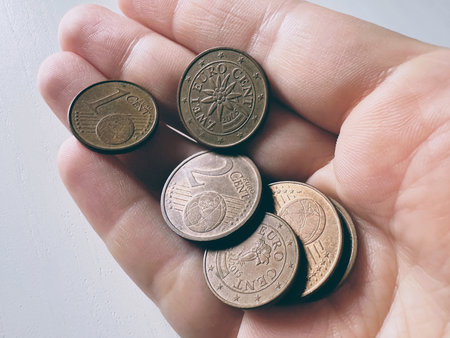Euro coins in an open palm.の写真素材