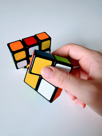 A shaped puzzle toy. A puzzle, with colorful pieces