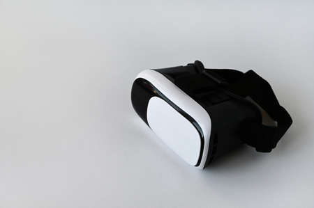 virtual reality glasses on a white background with copy space. The concept of a virtual game or video technology. Close-up.の写真素材