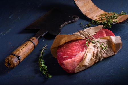 Raw meat, beef steak, cooking ingredients, spices.の写真素材
