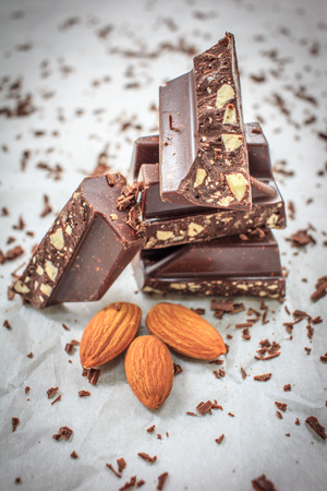 chocolate with almonds nuts closeupの写真素材