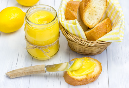 Lemon curd with lightly toasted baguetteの写真素材