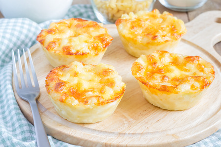 Macaroni and cheese baked as a little piesの写真素材