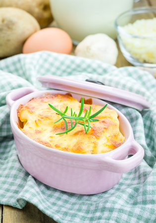 Potato gratin in ceramic mini cocotteの写真素材