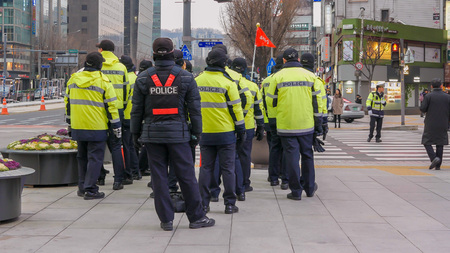 Police officers staying near gwanghwamun square during political demonstration, Seoul, South Korea, 02 December 2017のeditorial素材