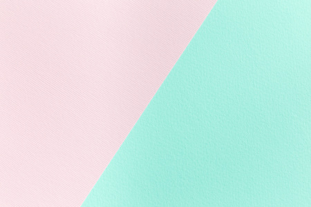 Blank background for template, pink and mint green paper texture, diagonal devided, horizontal, copy spaceの写真素材