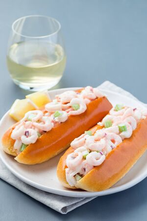 Shrimp rolls with hot dog brioche bun and shrimp salad,  verticalの写真素材