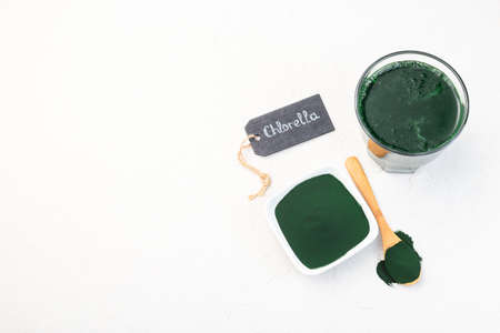 Superfood chlorella in powder and as a drink, horizontal, copy space, top viewの写真素材