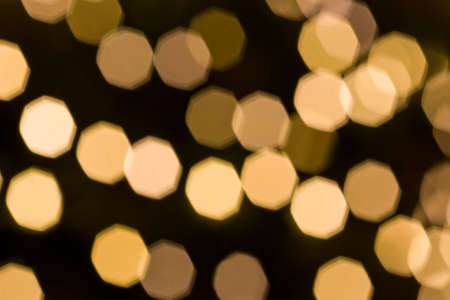 Overlay golden defocused bokeh light texture. Abstract bokeh background