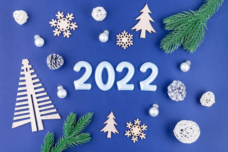 Christmas composition with number 2022, on festive backgroundの写真素材