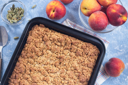 Delicious Peach Crisp or cobbler with brown sugar and oat streusel, horizontal, top viewの写真素材