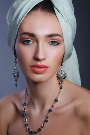 Eastern stylish model girl with a turban on his head. Jewelsの写真素材