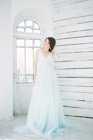 beautiful young girl in long dress. Fashion art photo.の写真素材