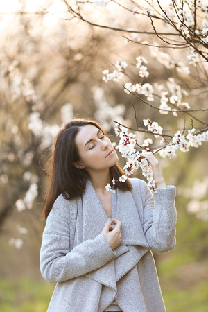 magnificent Girl in a blooming gardenの写真素材