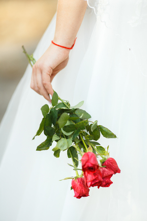 Sweet Wedding Bouquet in the Hands of the Brideの写真素材
