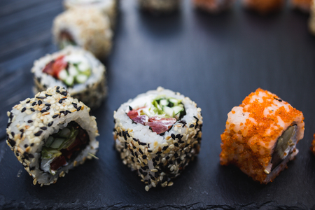 Japanese sushi on a rustic dark backgroundの写真素材