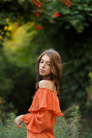 Sexy young beauty woman in fluttering dressの写真素材