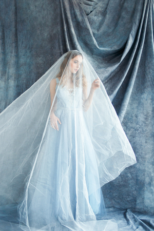 tender bride under the veilの写真素材