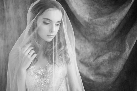tender bride under the veilの写真素材