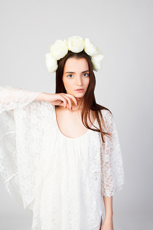 Girl with clean skin and beautiful face and roses hairstyleの写真素材