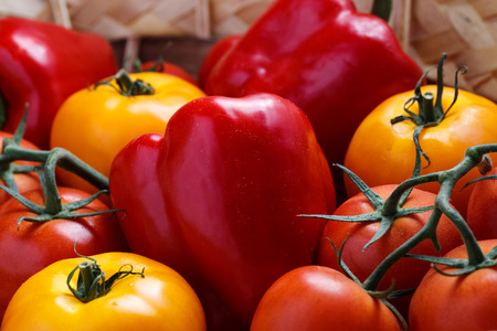 Composition of sweet red pepper and yellow tomatoesの写真素材