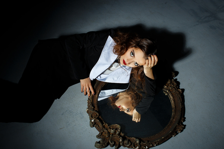 Performance with a girl and mirrorの写真素材