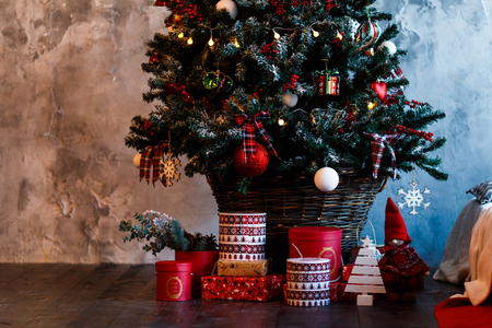 Christmas decorated fir tree with gifts and Christmas decorの写真素材