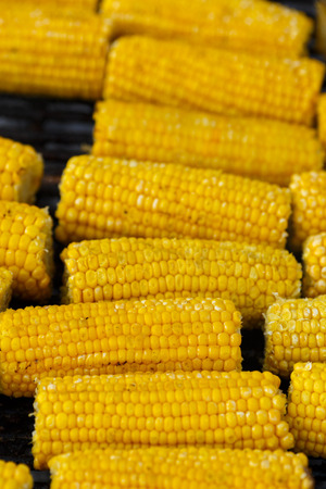 Cooking corn on the grillの写真素材