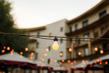 warm light bulbs at the evening eventの写真素材