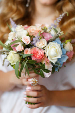 Wedding bouquet of sweet roses and other beautiful flowersの写真素材