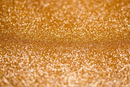 Golden bokeh glitter texture christmas abstractの写真素材