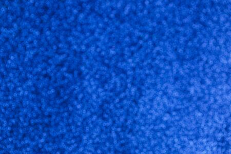 Electric blue bokeh glitter texture christmas abstractの写真素材