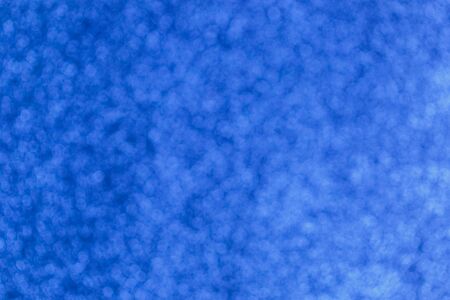 Electric blue bokeh glitter texture christmas abstractの写真素材