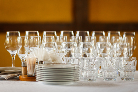 Glasses for wine and champagne at a buffet tableの写真素材