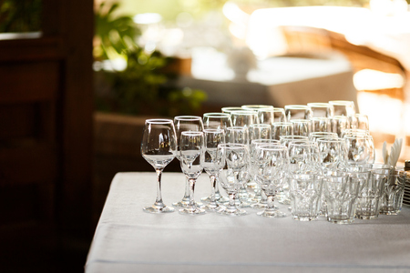 Glasses for wine and champagne at a buffet tableの写真素材