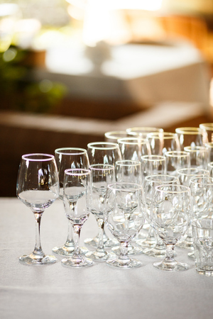 Glasses for wine and champagne at a buffet tableの写真素材