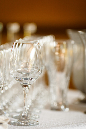 Glasses for wine and champagne at a buffet tableの写真素材