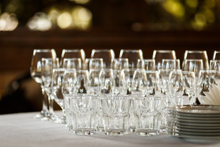 Glasses for wine and champagne at a buffet tableの写真素材
