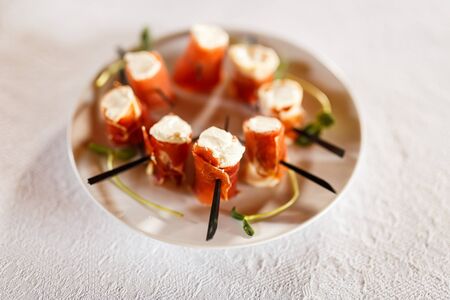 Delicious Canapes snacks with cheese on the buffet tableの写真素材