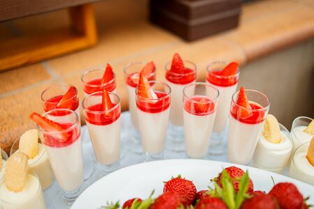Strawberry with chantilly in white plate on a partyの写真素材
