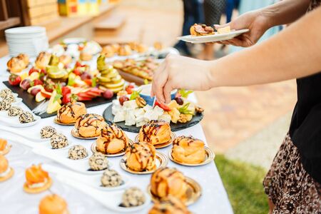 Snacks and canapes on the holiday tableの写真素材