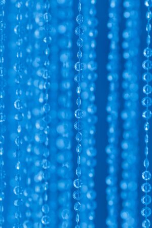 Blue electric bokeh glitter texture christmas abstract backgroundの写真素材