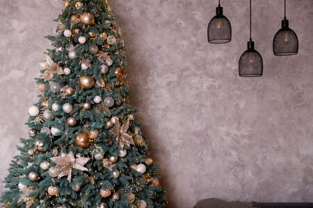 Christmas Balls And Decorations On A Beautiful Christmas Tree. Decorated Christmas Interior. Place For Text.の写真素材