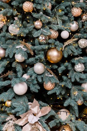 Christmas Balls And Decorations On A Beautiful Christmas Tree. Decorated Christmas Interior. Place For Text.の写真素材