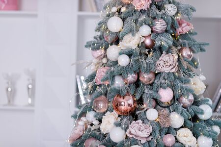 Christmas Balls And Decorations On A Beautiful Christmas Tree. Decorated Christmas Interior. Place For Text.の写真素材