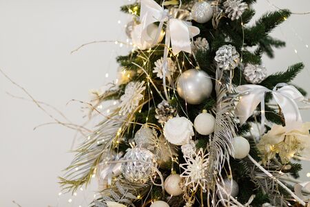 Christmas Balls And Decorations On A Beautiful Christmas Tree. Decorated Christmas Interior. Place For Text.の写真素材