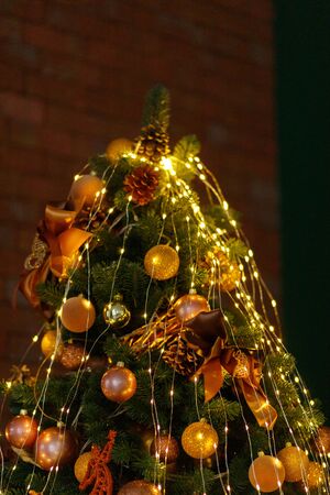 Christmas Balls And Decorations On A Beautiful Christmas Tree. Decorated Christmas Interior. Place For Text.の写真素材