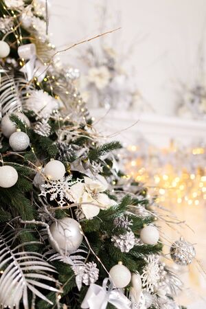 Christmas Balls And Decorations On A Beautiful Christmas Tree. Decorated Christmas Interior. Place For Text.の写真素材