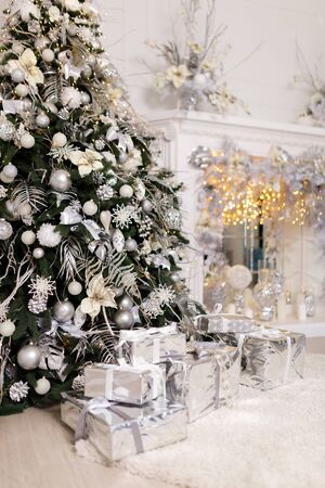Christmas Balls And Decorations On A Beautiful Christmas Tree. Decorated Christmas Interior. Place For Text.の写真素材