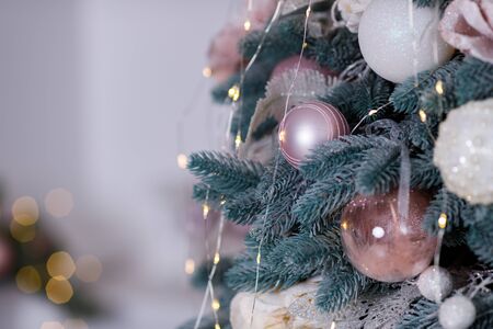 Christmas Balls And Decorations On A Beautiful Christmas Tree. Decorated Christmas Interior. Place For Text.の写真素材